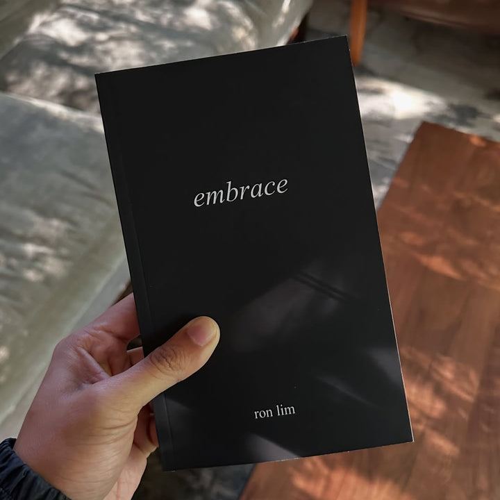 Poetry book titled 'Embrace' by Ron Lim