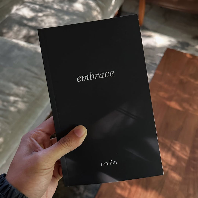 Poetry book titled 'Embrace' by Ron Lim